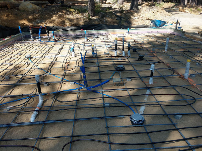 Colfax, CA Floor heating System Hydronic pipe in grid on dirt foundation
