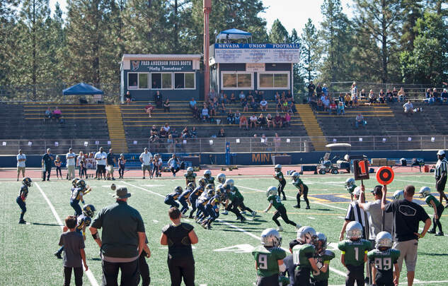 Nevada Union Jr. Miners football team playing at the Hooper Stadium in Nevada City