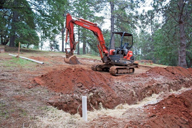 Nevada City, CA New Home Leach Field Excavated with Tractor working
