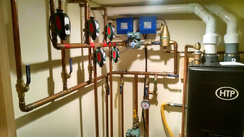 Nevada City, CA Radiant Heating System Installation Heating Unit with boiler and copper pipe