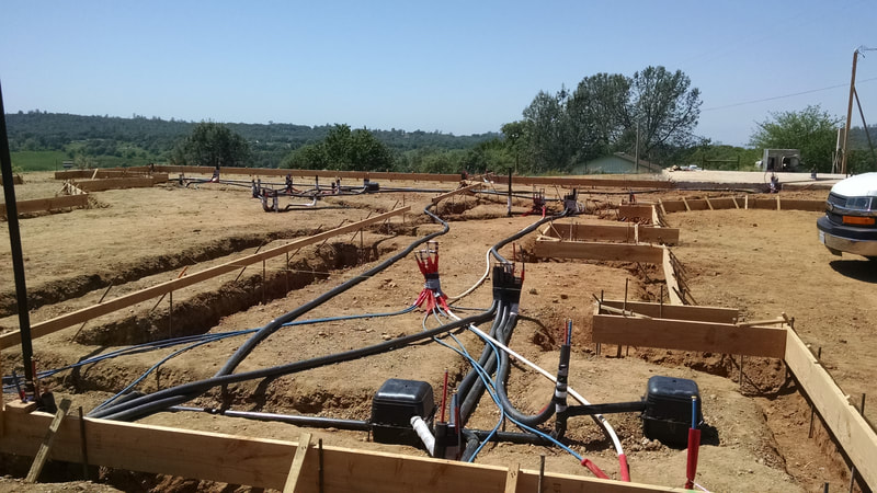 Alta Sierra, Grass Valley, CA New Home Construction Rough Plumbing Supply Drain Lines Installation in foundation footings, PEX and black supply lines